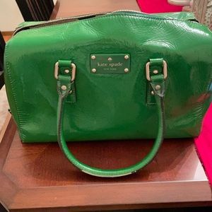 Green Kate Spade bag.